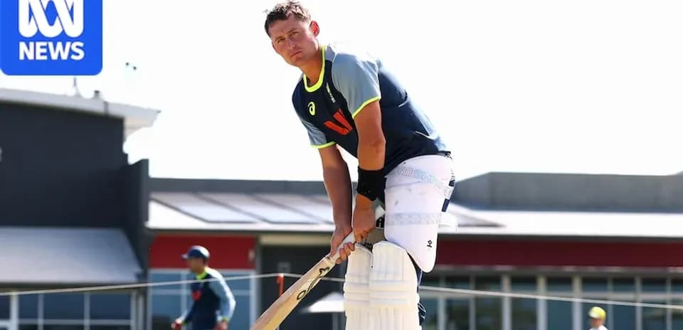 Jugador de cricket preparándose para batear en el campo