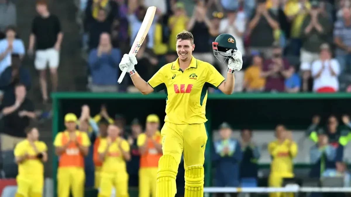 Jugador de cricket levantando bate tras anotación