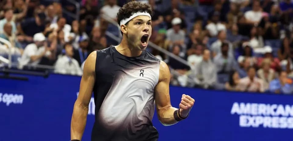 Jugador de tenis celebrando en el US Open