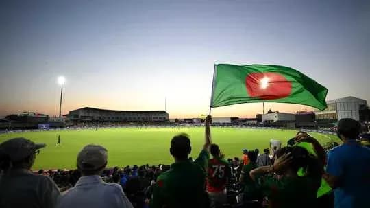 Afan waving Bangladesh flag at cricket match