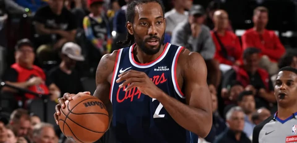Kawhi Leonard dribbling basketball during game