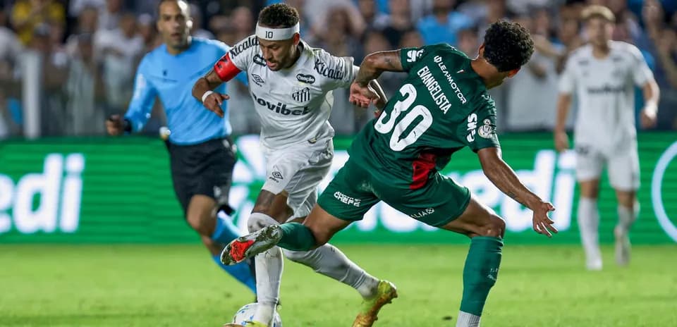 Neymar dribbling past a defender during match
