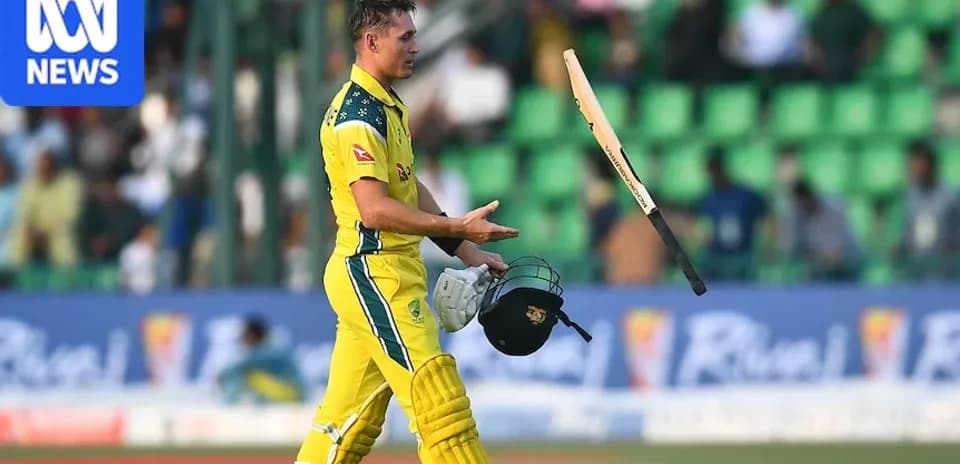 Jugador australiano de cricket lanzando su bate