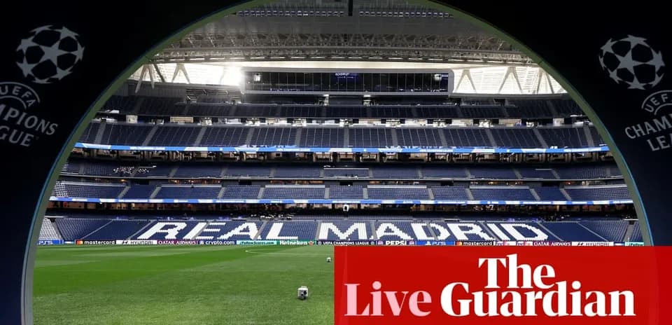 Estadio con el nombre 'REAL MADRID' visible en el césped