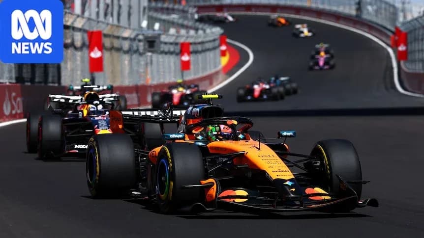 Coche de Fórmula 1 de McLaren liderando carrera Coche de Fórmula 1 de McLaren liderando carrera
