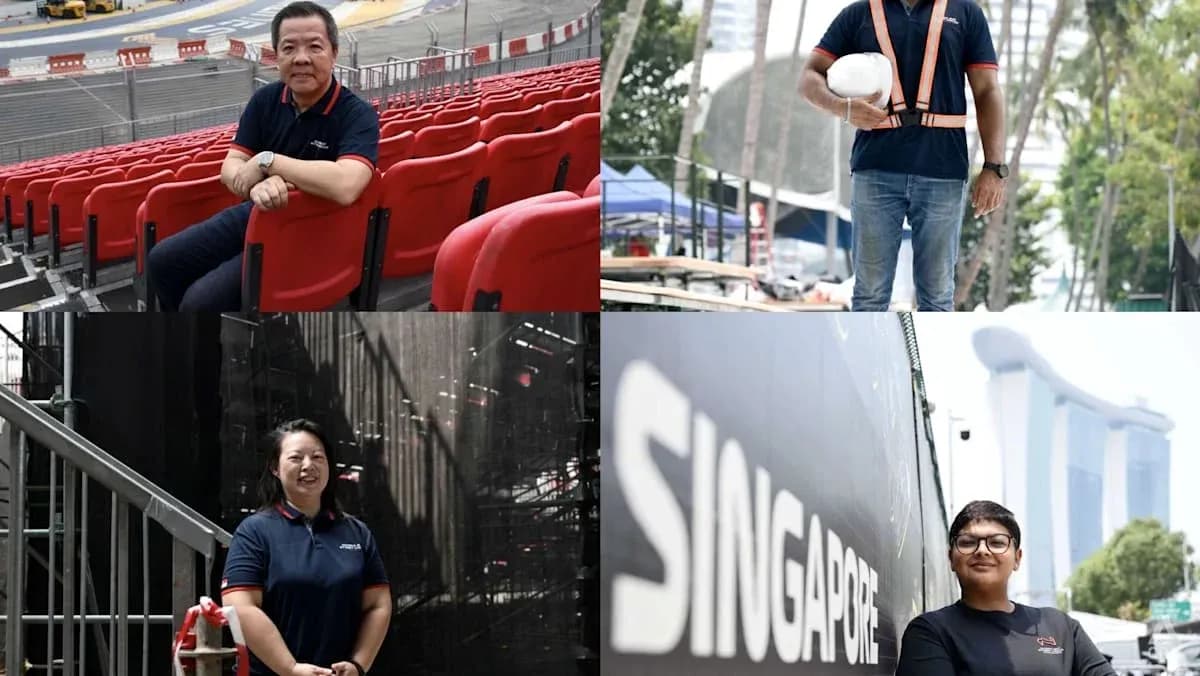 Cuatro personas en el circuito de carreras de Singapur Cuatro personas en el circuito de carreras de Singapur